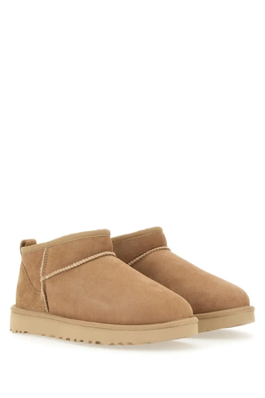 Ugg women’s boot classic ultra mini beige tan suede boots with plush upper and chunky rubber sole