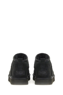Ugg women’s boot classic ultra mini black with suede exterior and plush shearling lining for cozy wear