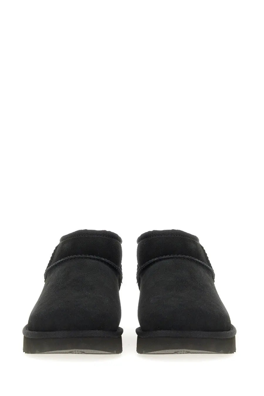 Ugg women’s boot classic ultra mini black suede booties with plush interior and stitched detailing