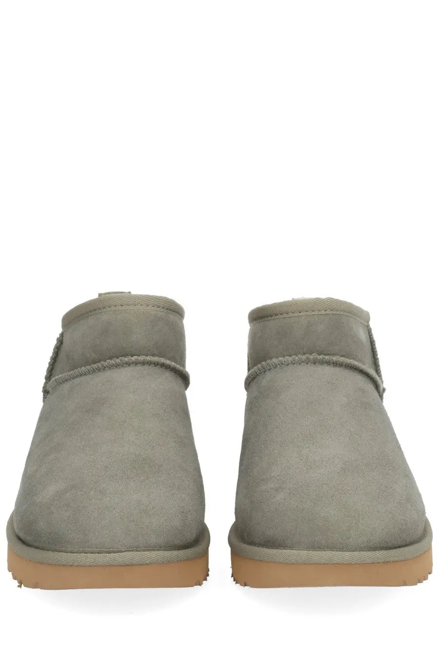 Ugg women’s boot classic ultra mini green gray suede booties with tan rubber sole and stitched detailing