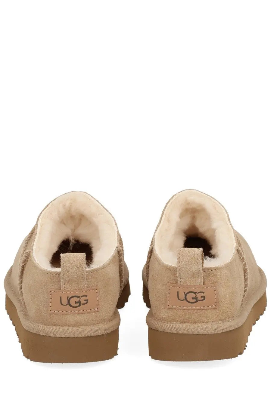 Ugg women’s classic micro boots beige with beige suede slip-on design and plush shearling lining with tan rubber sole