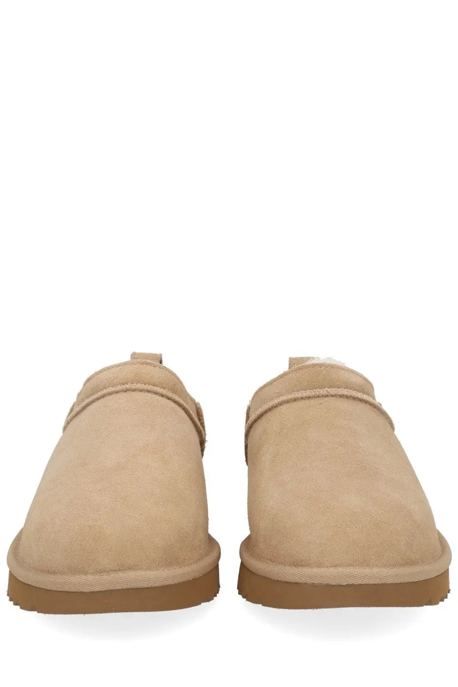 Ugg women’s classic micro boots beige slip-on moccasins with beige suede, plush interior, and tan rubber soles