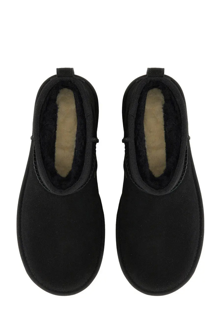 Black suede ugg women’s classic ultra mini boot with plush beige lining for cozy stylish wear