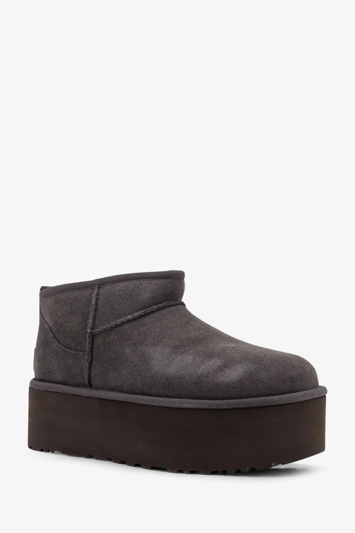 Ugg women’s classic ultra mini platform suede ankle boots in dark gray with a thick dark brown rubber sole