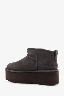 Ugg women’s classic ultra mini platform suede ankle boot in dark gray with thick dark brown rubber sole