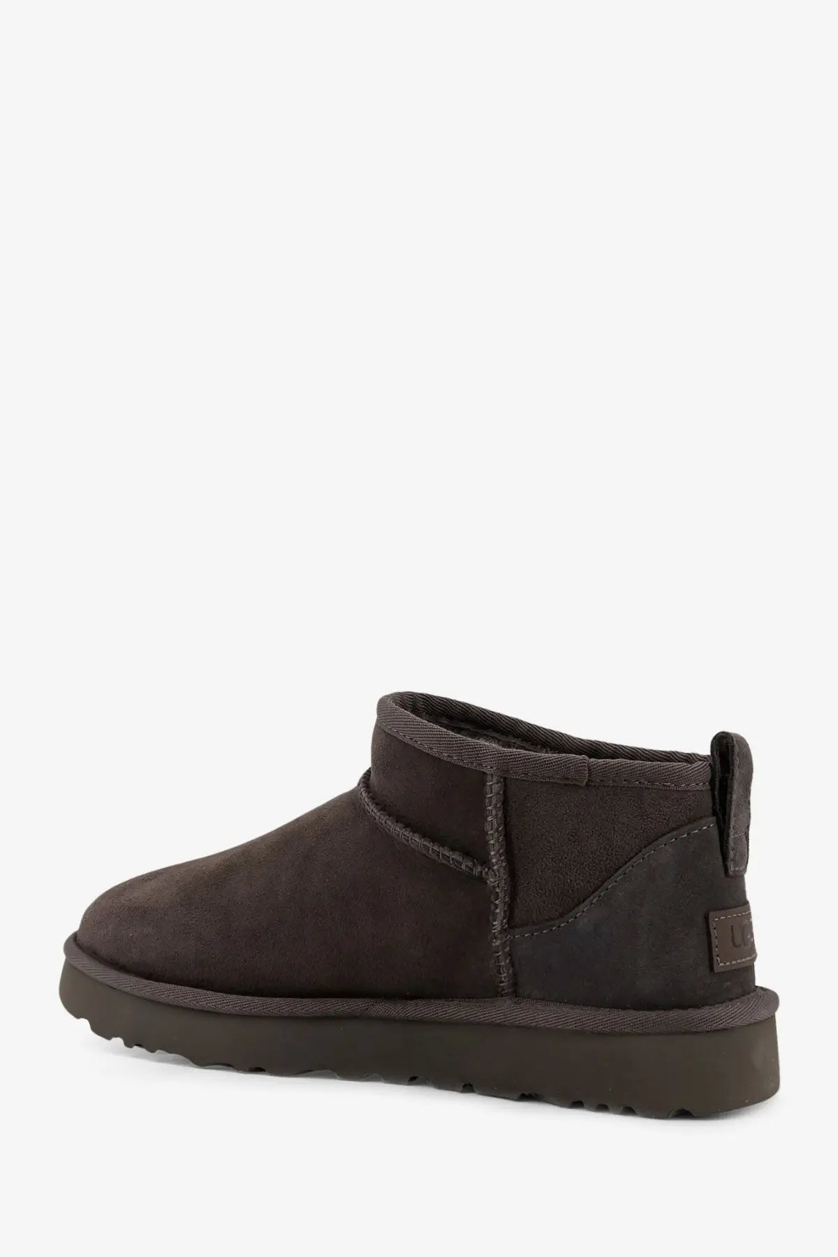 Ugg women’s classic ultra mini suede ankle boots in grey with dark brown suede, plush interior, and rubber sole