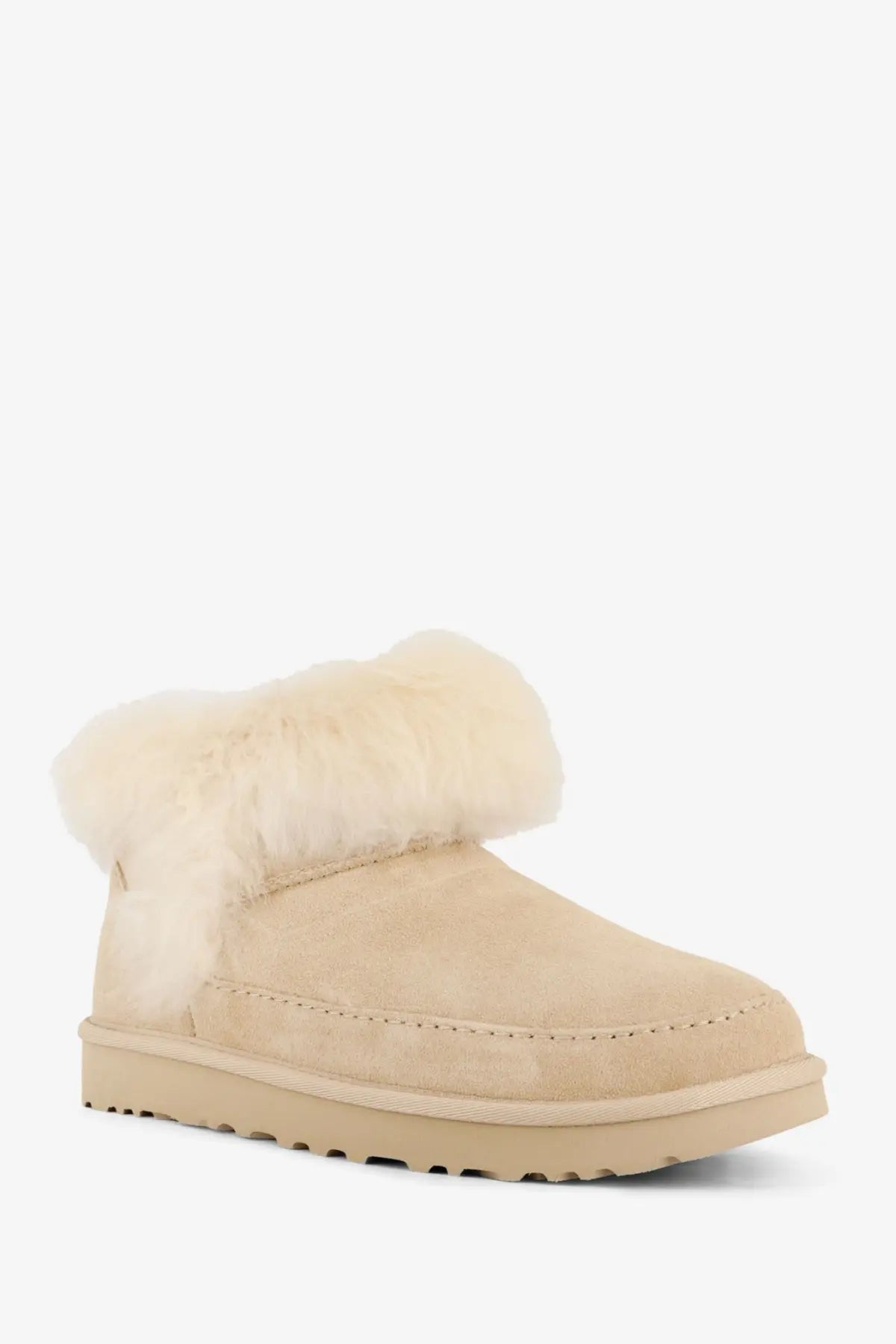 Beige suede ugg women’s classic ultra mini boot with plush cream shearling cuff for cozy wear