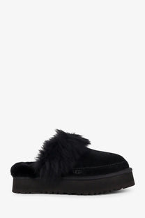Ugg Women’s Disquette Chalet suede mules in black with plush shearling lining and thick platform sole