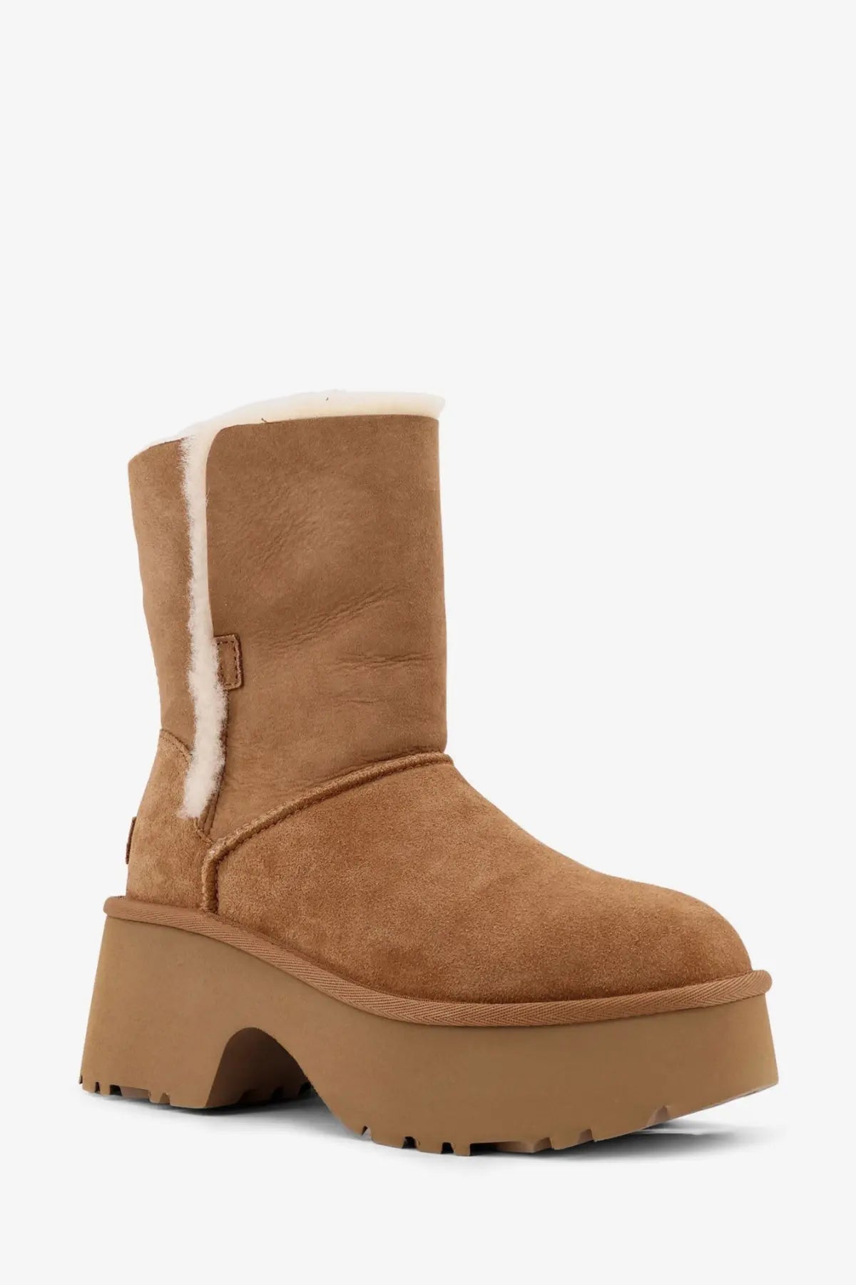 UGG women’s Esmee tan suede boot with plush white shearling lining and chunky platform sole brown color