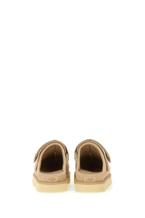 Ugg women’s goldenstar sabot beige mule sandals with velcro straps and cushioned sole for comfortable wear