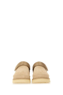 Ugg women’s goldenstar sabot beige suede moccasin slip-ons with a single strap across the instep