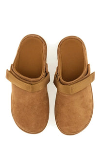 Ugg women’s goldenstar sabot brown tan suede moccasin-style slip-ons with wide strap across the foot