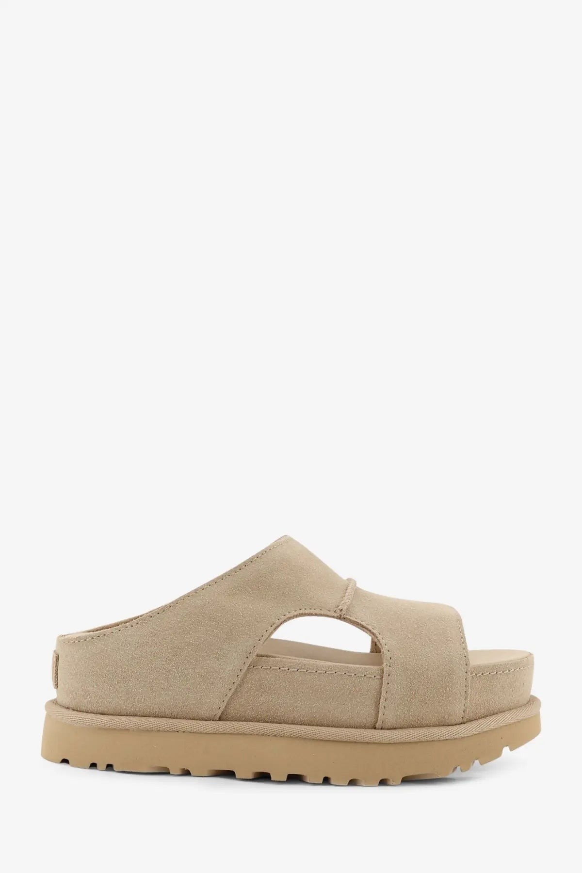 Beige suede slide sandal with chunky rubber sole from UGG women’s Goldenstar collection