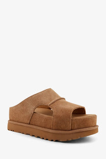 Ugg women’s goldenstar tan suede slide sandal with chunky rubber sole for casual wear