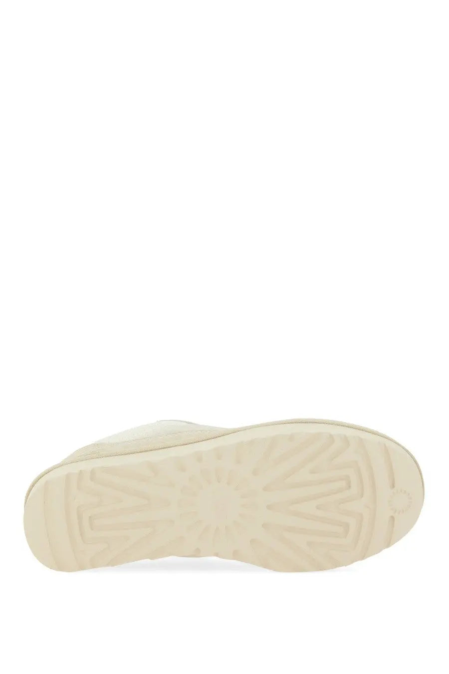 Cream-colored rubber sole with subtle geometric tread on ugg women’s lowmel sneaker in beige