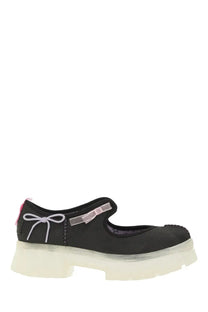 Ugg women’s mary jane areum black platform shoe with white bow detail and translucent sole for stylish comfort