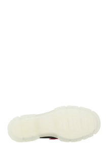 Ugg women’s mary jane areum black shoe with white rubber sole featuring chunky textured design