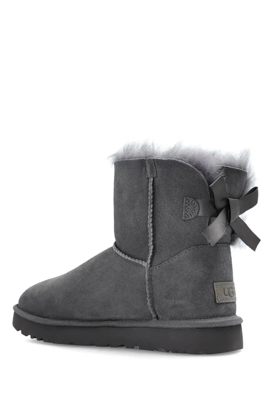 Ugg women’s mini bailey bow ii boot in grey suede with matching bow and fluffy shearling lining