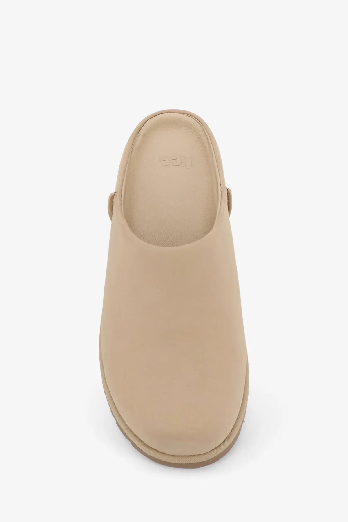 Beige ugg women’s nubuck sandals featuring a soft suede-like upper and cushioned sole for comfortable wear