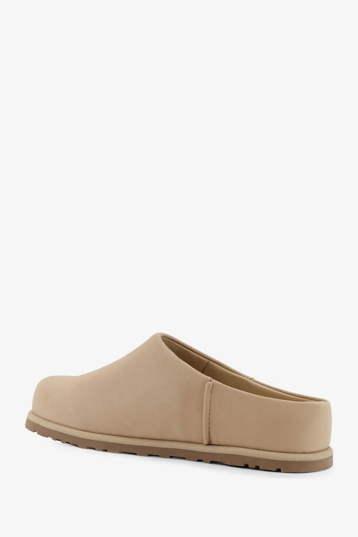 Beige ugg women’s nubuck slip-on clog with smooth minimalist design and slightly textured rubber sole