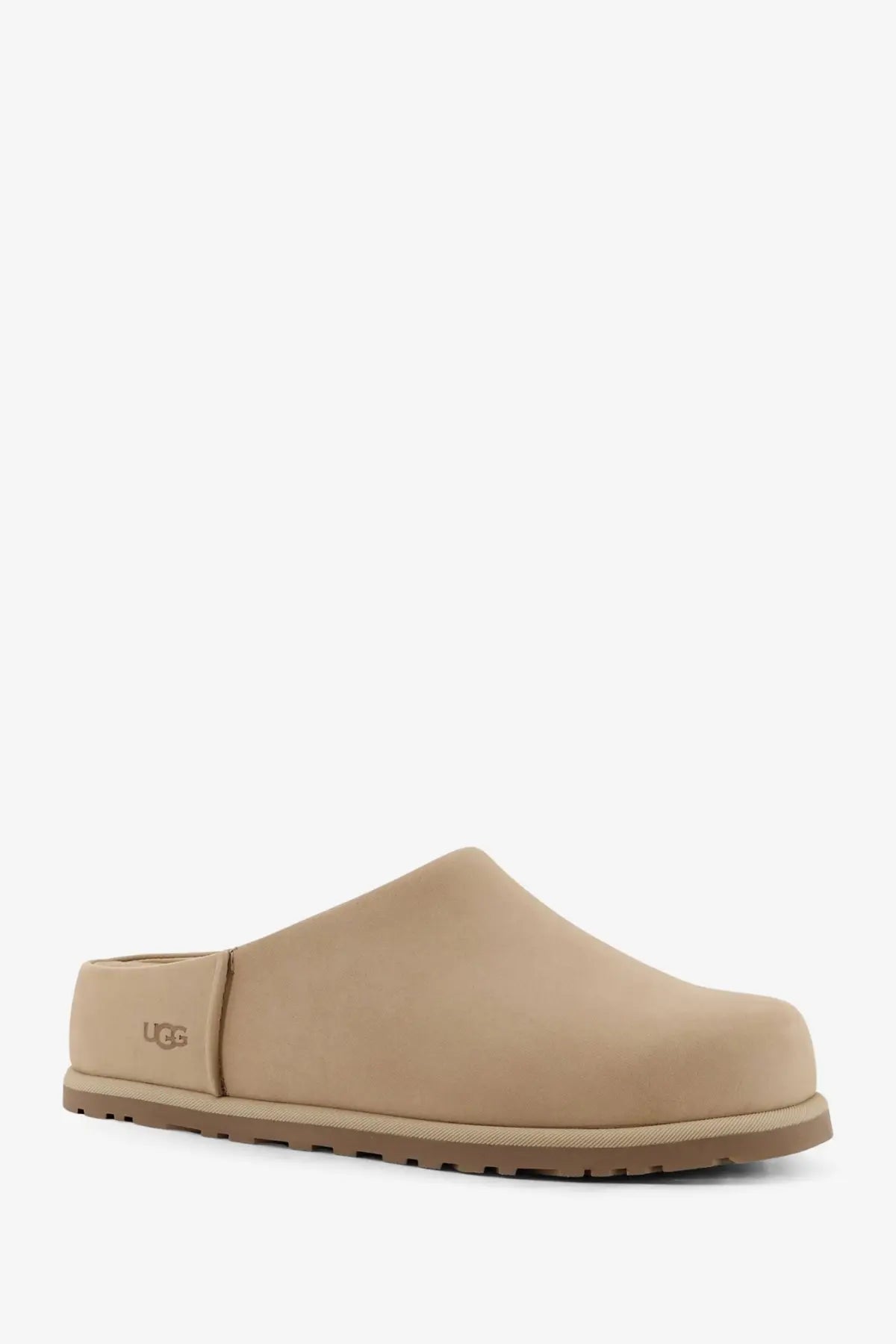 Beige ugg women’s nubuck slip-on clog with suede upper and rubber sole for casual wear