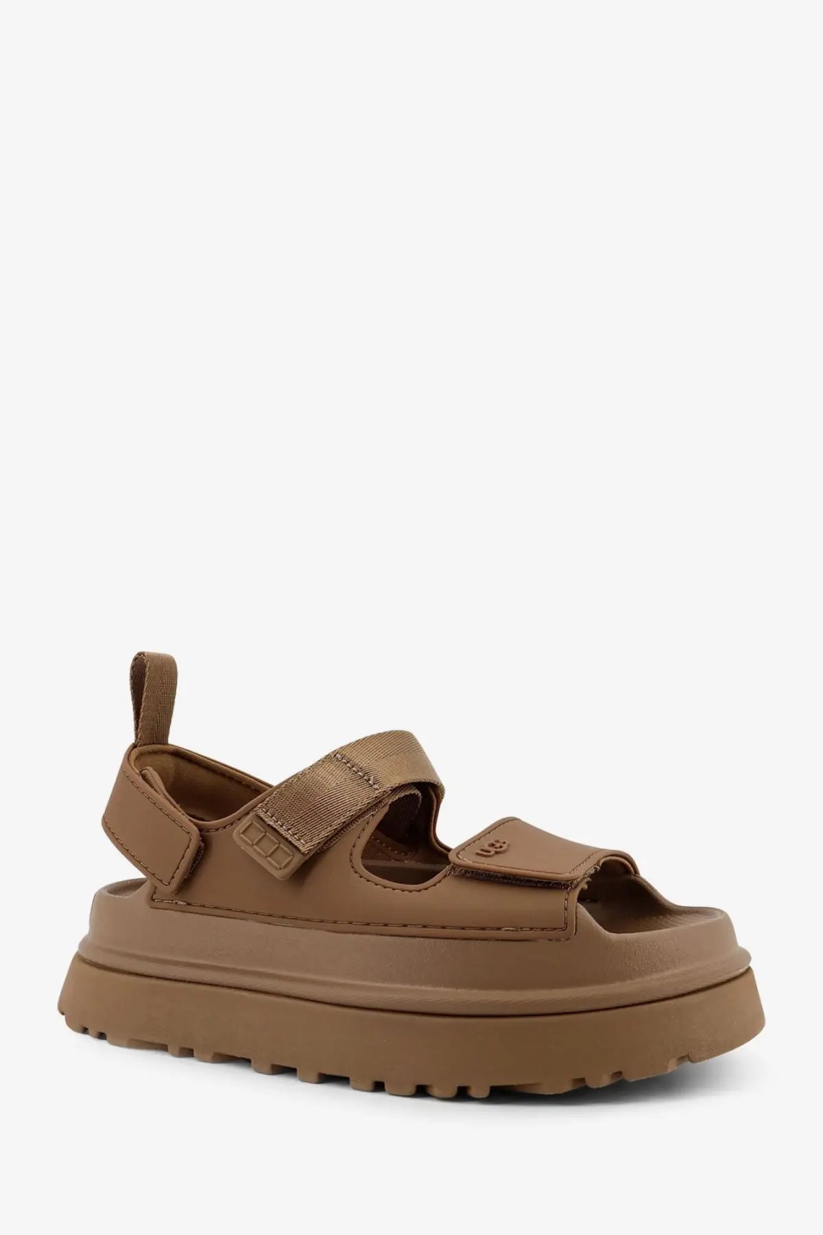 Ugg women’s brown rubber platform sandals with adjustable velcro straps and chunky rubber sole