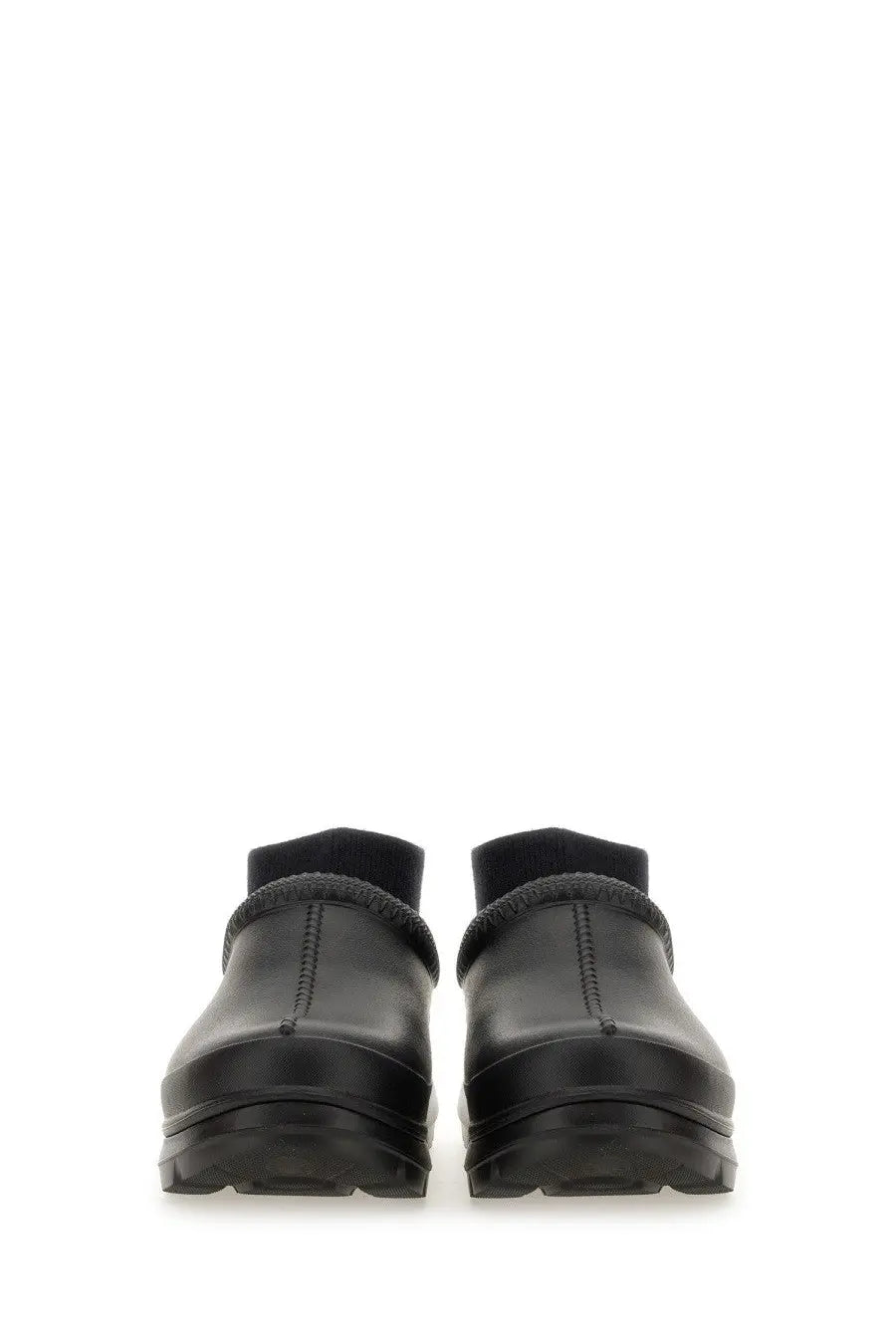 Ugg women’s sabot tasman black leather clog shoes with thick textured sole and ribbed ankle cuffs visible from the back