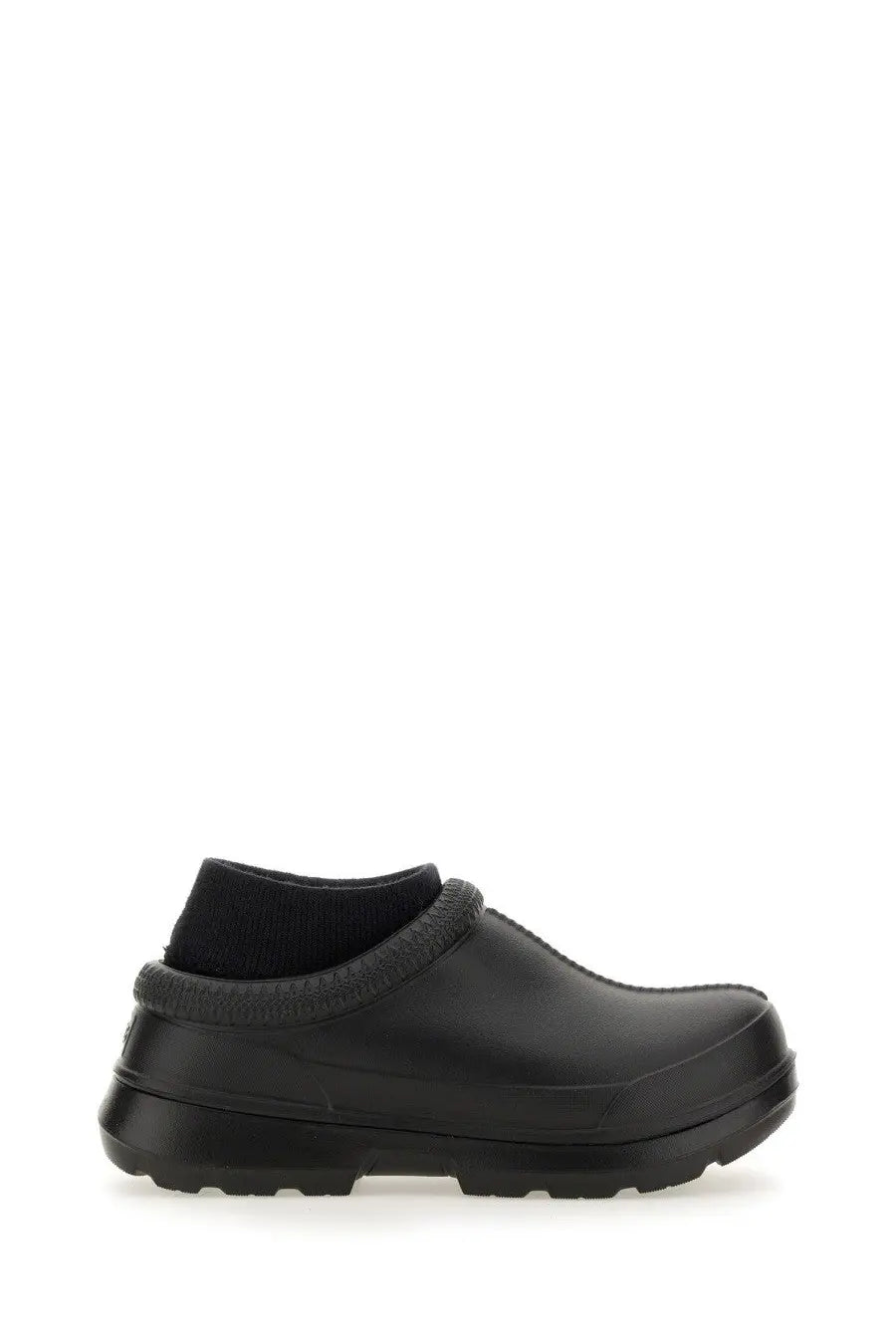 Ugg women’s sabot tasman black clog with black rubber material, textured ribbed ankle cuff, and chunky sole