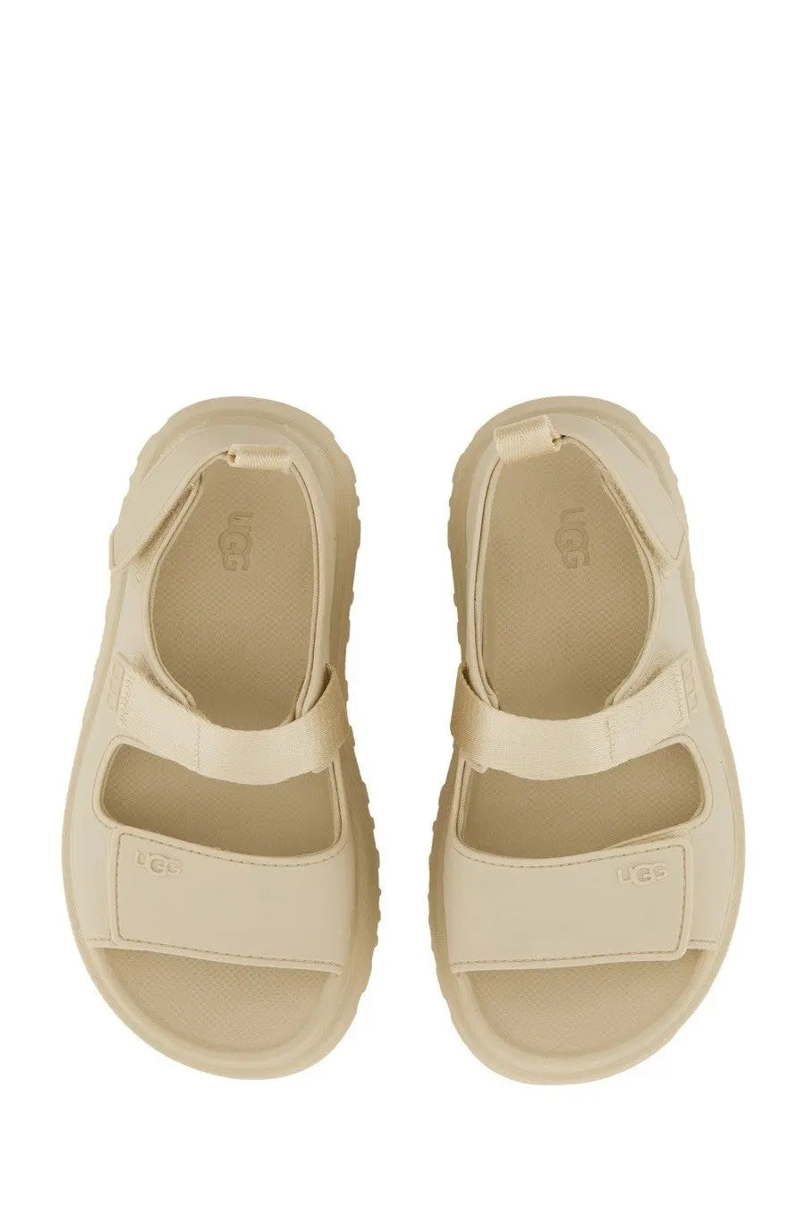 Ugg women’s cream-colored platform sandals with thick textured sole and adjustable straps in beige goldenglow