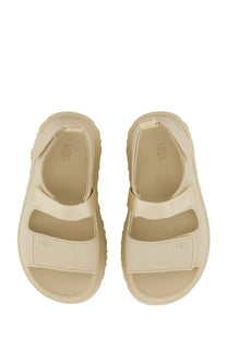 Ugg women’s cream-colored platform sandals with thick textured sole and adjustable straps in beige goldenglow