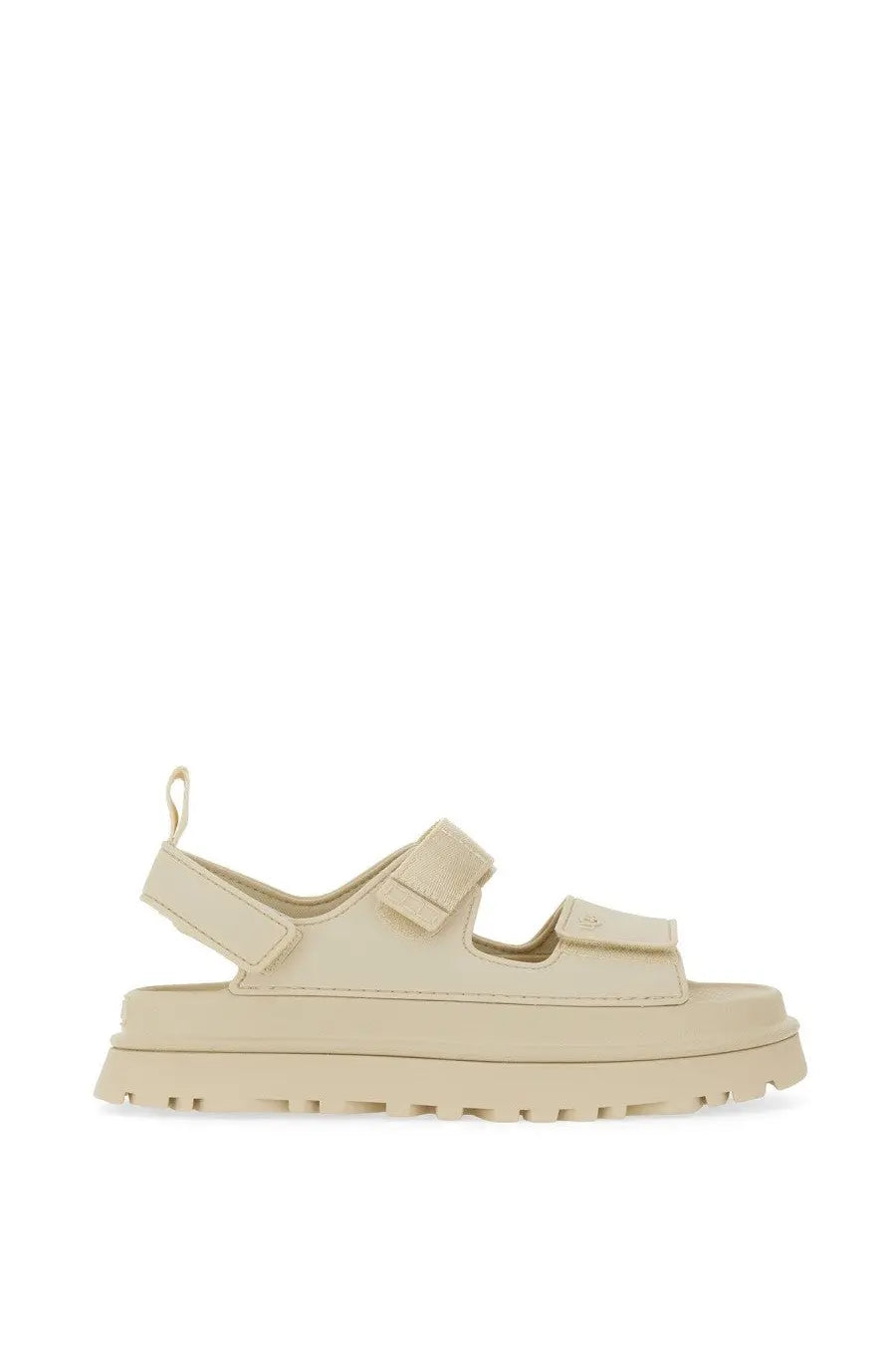 Ugg women’s cream-colored platform sandal with two adjustable velcro straps and chunky rubber sole in goldenglow beige