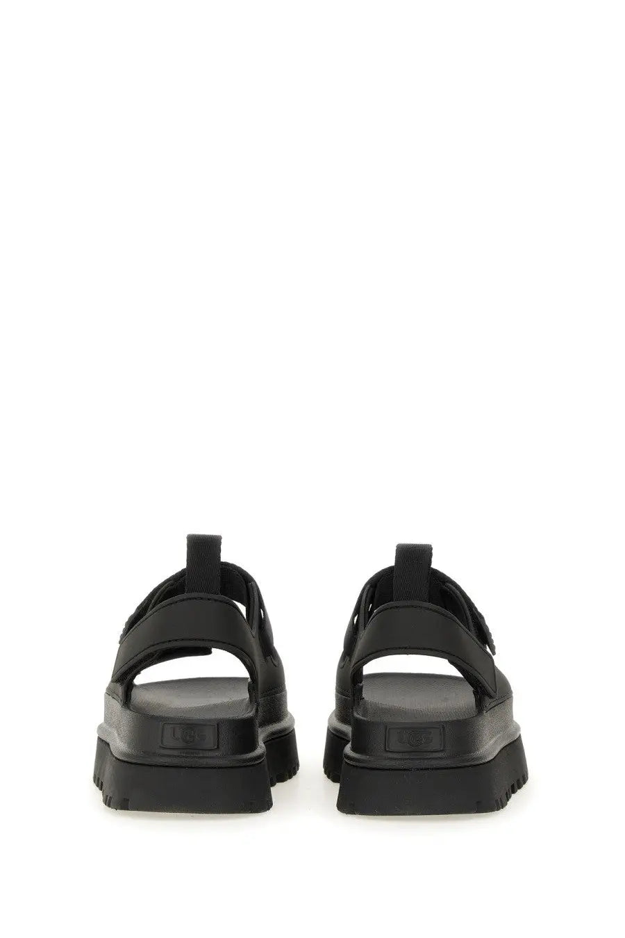UGG women’s sandal goldenglow black platform with thick rubber soles and adjustable strap closures