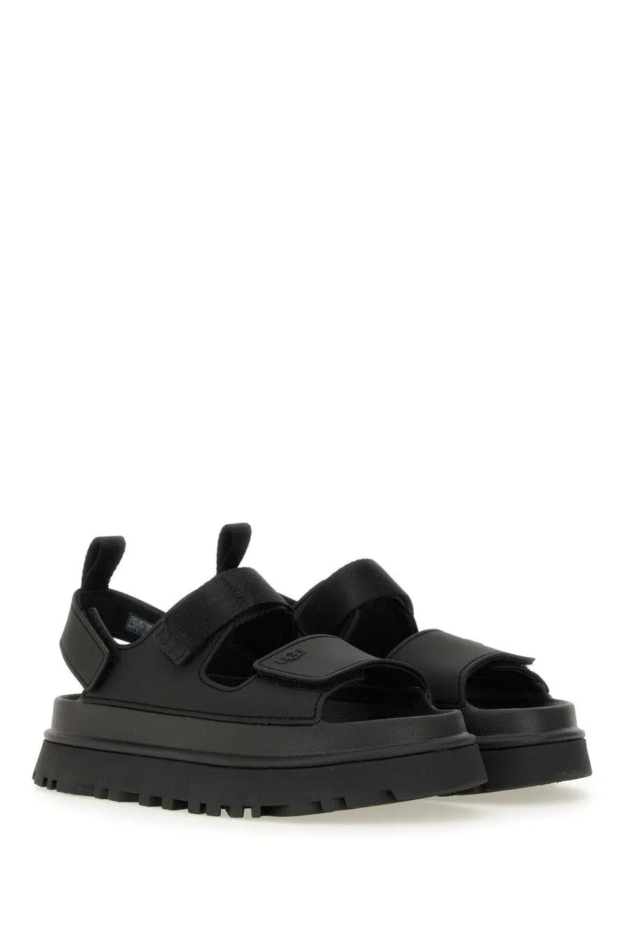 Ugg women’s sandal goldenglow black featuring black platform with wide velcro straps and chunky rubber sole