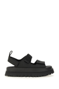 Ugg women’s sandal goldenglow black platform sandal with two velcro straps and thick textured sole front view