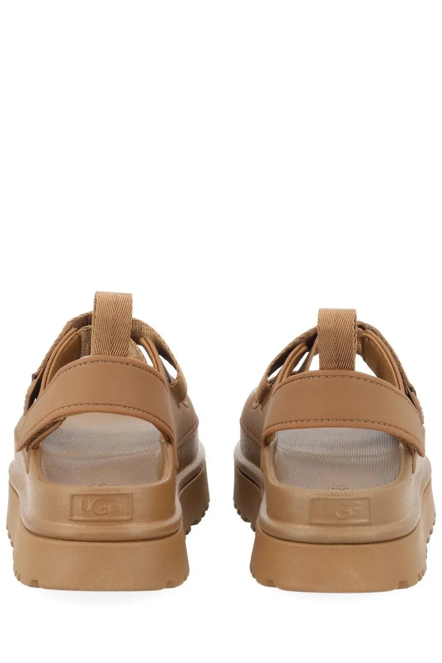 Ugg women’s sandal goldenglow brown with tan thick chunky soles and adjustable straps for casual wear