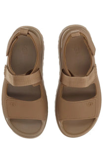 Ugg women’s sandal Goldenglow brown tan with thick cushioned sole and adjustable velcro straps