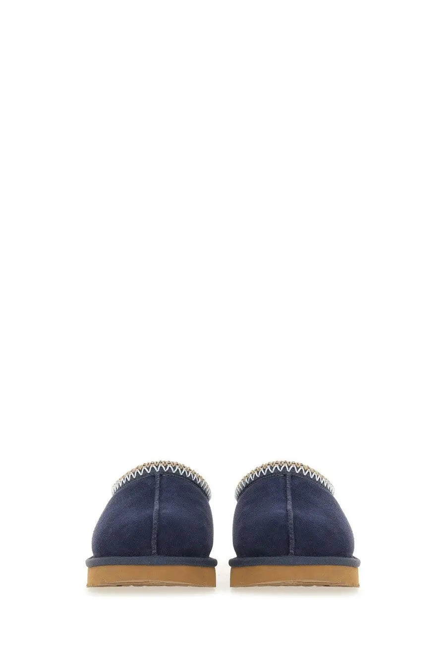 Ugg women’s sandalwood tasman blue navy blue suede moccasin slippers with zigzag stitched trim and tan rubber soles