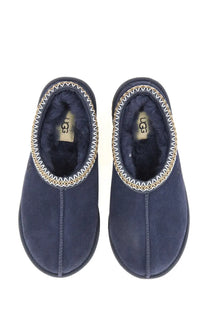 Ugg women’s sandalwood tasman blue navy blue suede slip-on slippers with gold and white zigzag stitching along opening