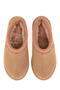 Ugg women’s sandalwood tasman brown tan suede slip-on slippers with plush brown shearling lining and coral stitched trim