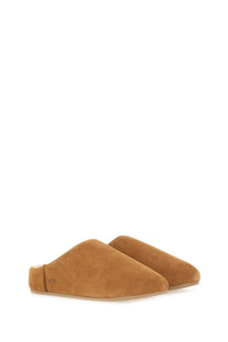 UGG women’s slip on elea brown tan suede mules with soft plush interior and minimalist design