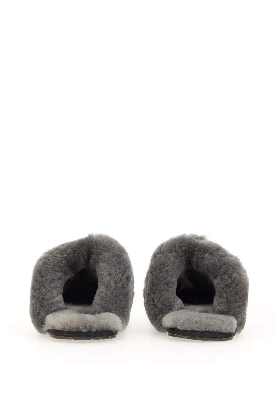Ugg women’s slip on sandal scuffette black gray sheepskin slip on mules with plush texture and black rubber soles