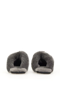 Ugg women’s slip on sandal scuffette black gray sheepskin slip on mules with plush texture and black rubber soles