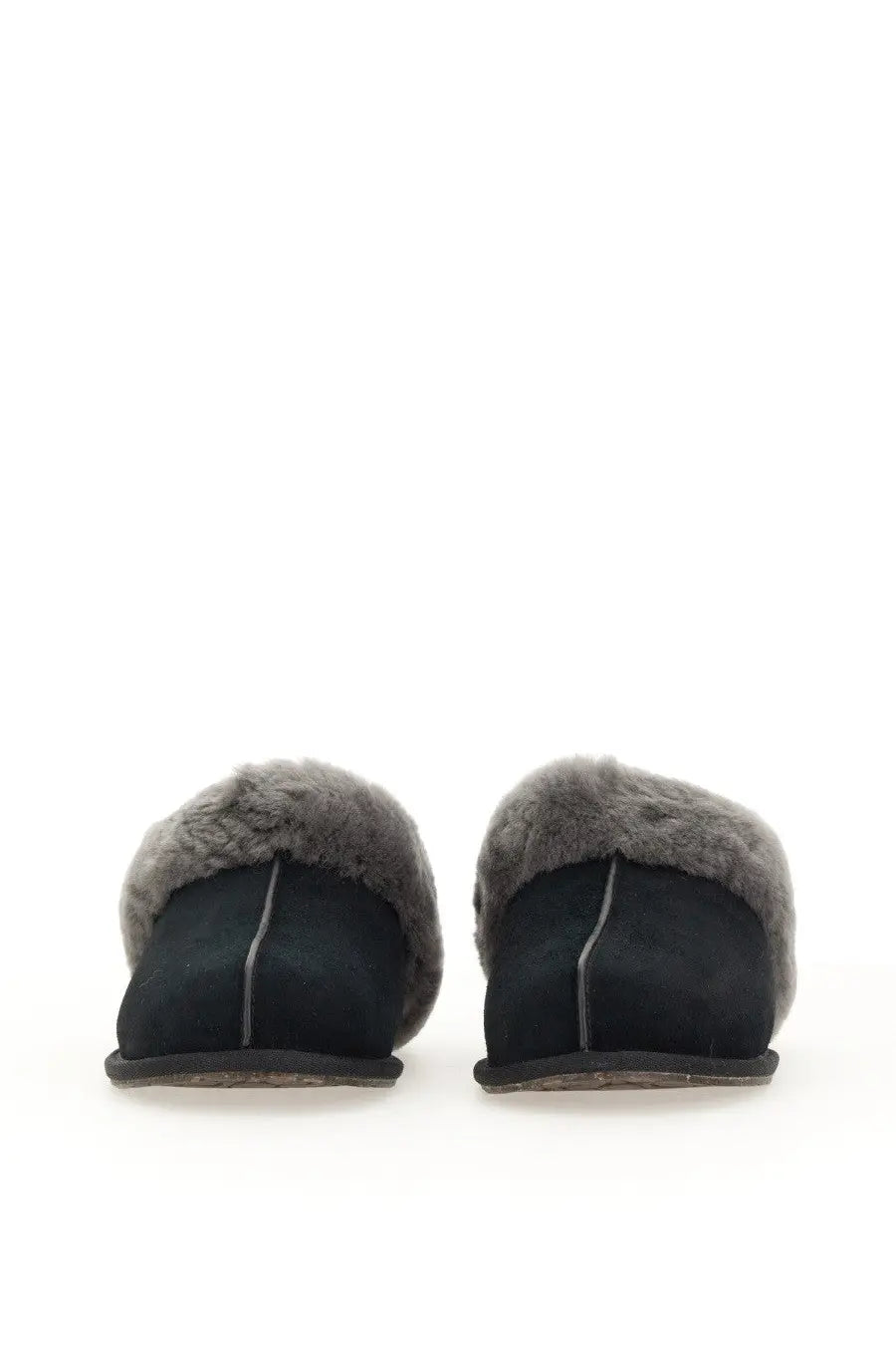 Ugg women’s slip on sandal scuffette black in black suede with gray shearling lining and subtle side stitching