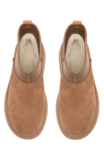 Ugg womens stivale classic mini dipper tan suede booties with plush white shearling lining and orange pull tabs