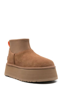 Ugg womens stivale classic mini dipper brown tan suede platform boot with thick rubber sole and orange pull tab back view