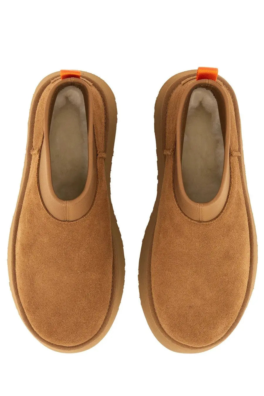 Ugg women’s stivale classic mini dipper brown tan suede slip-on boots with thick rubber sole and orange pull tabs