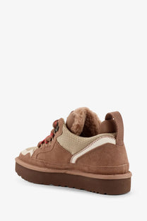 Ugg women’s beige lowmel sneaker with brown suede mesh, plush fur lining, and cream accents on side and toe cap