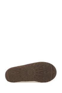 Brown rubber sole with radiating tread pattern and embossed ugg logo on ugg women’s tasman caspian sandal