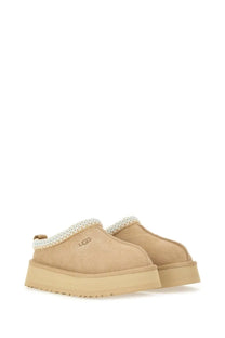Beige ugg women’s tazz ii plateau sandal with suede upper and textured knit trim platform slip-on mules