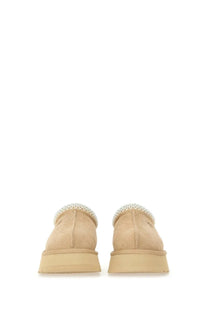 Ugg women’s tazz II plateau sandal beige beige suede slip-on mules with white crocheted trim around the collar